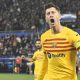 La Liga 2023/2024: Selebrasi gol Robert Lewandowski dalam laga Alaves vs Barcelona di pekan 23 (c) AP Photo/Alvaro Barrientos