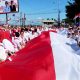 Pencanangan HUT RI_ ASN dan Siswa di Bone Bolango Bentangkan Bendera Merah Putih Panjang 79 Meter