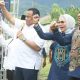 Anggota DPR RI, Rachmat Gobel, Cabup dan Cawabup Bone Bolango, Merlan Uloli dan Syamsu Botutihe pada acara deklarasi yang berlangsung beberapa waktu lalu. (Foto: Tim pemenangan MULUS)