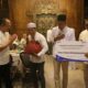                  Penyerahan santunan
diwakili oleh Pejabat Eksekutif Aestika Oryza Gunarto dan Komisaris Independen Hari Siaga Amijarso.    