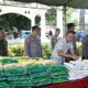 Gerakan Pangan Murah di Tilamuta, Rum Pagau dan Lahmuddin Ikut Layani Warga Belanja Sembako